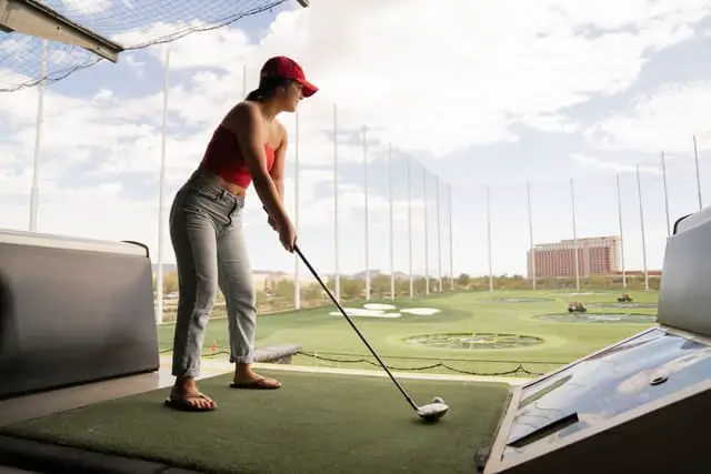 Practicing on driving range